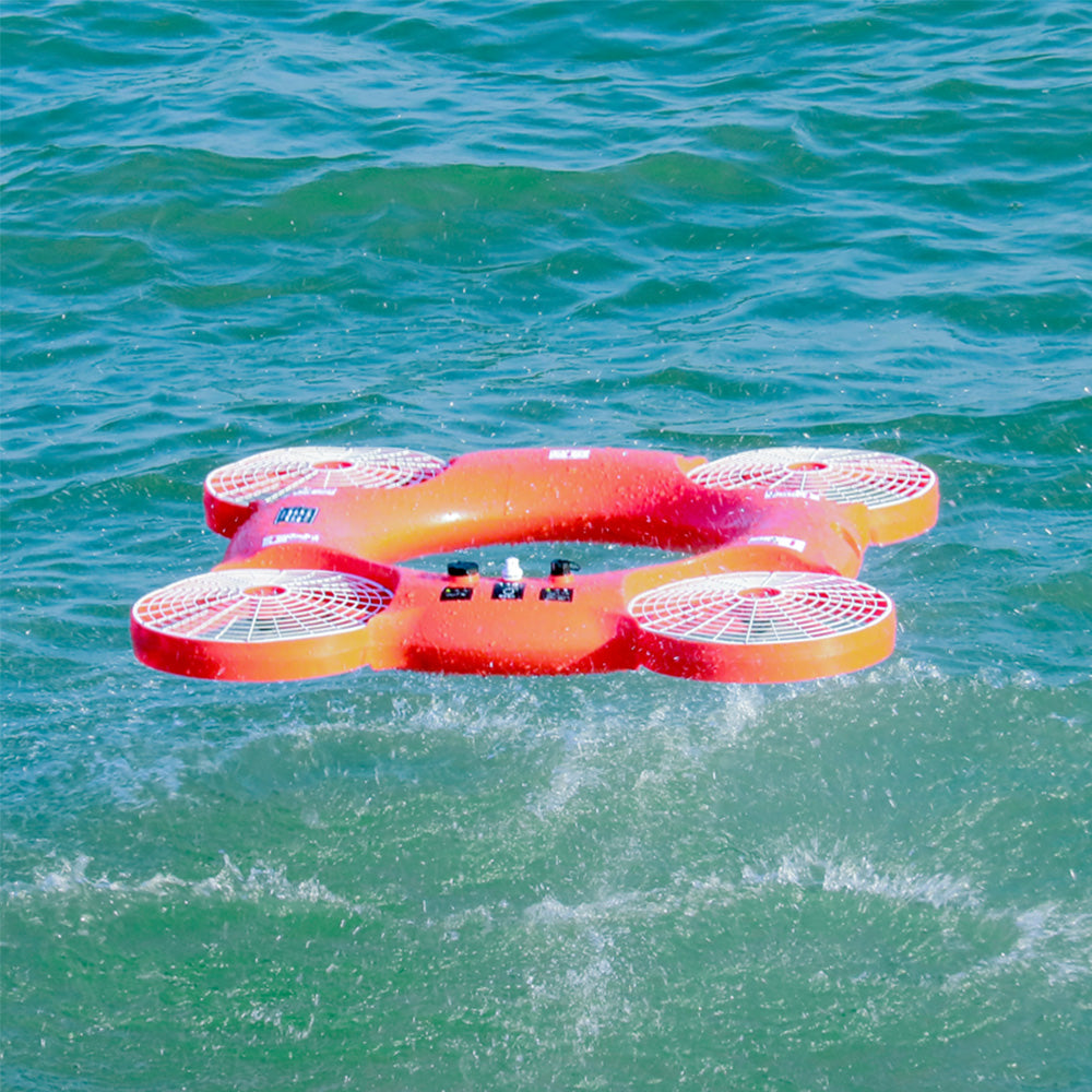 Lifeguards guide a flying Lifebuoy to a drawing swimmer.